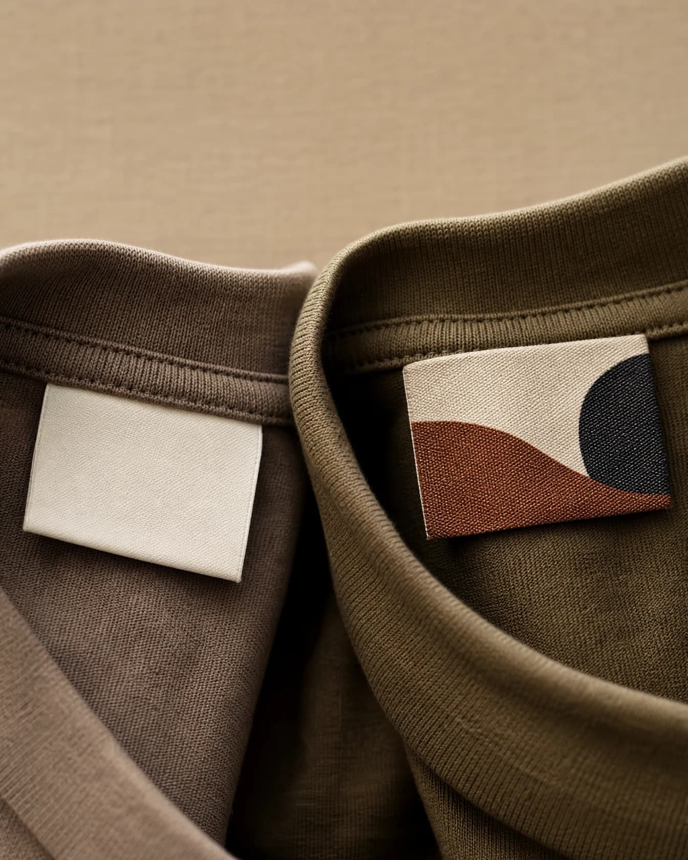 Two garment labels side by side, one blank and one custom