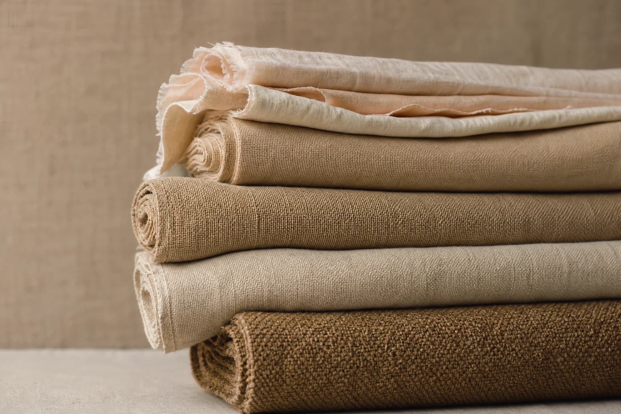 Stacked fabric bolts of varying thickness from lightweight to heavyweight